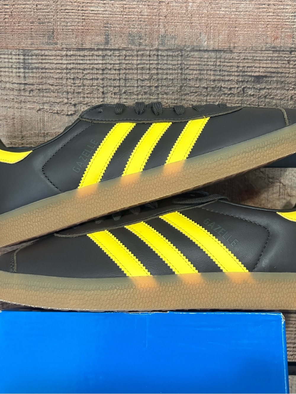adidas Black Gazelle Sneakers with Yellow Stripes